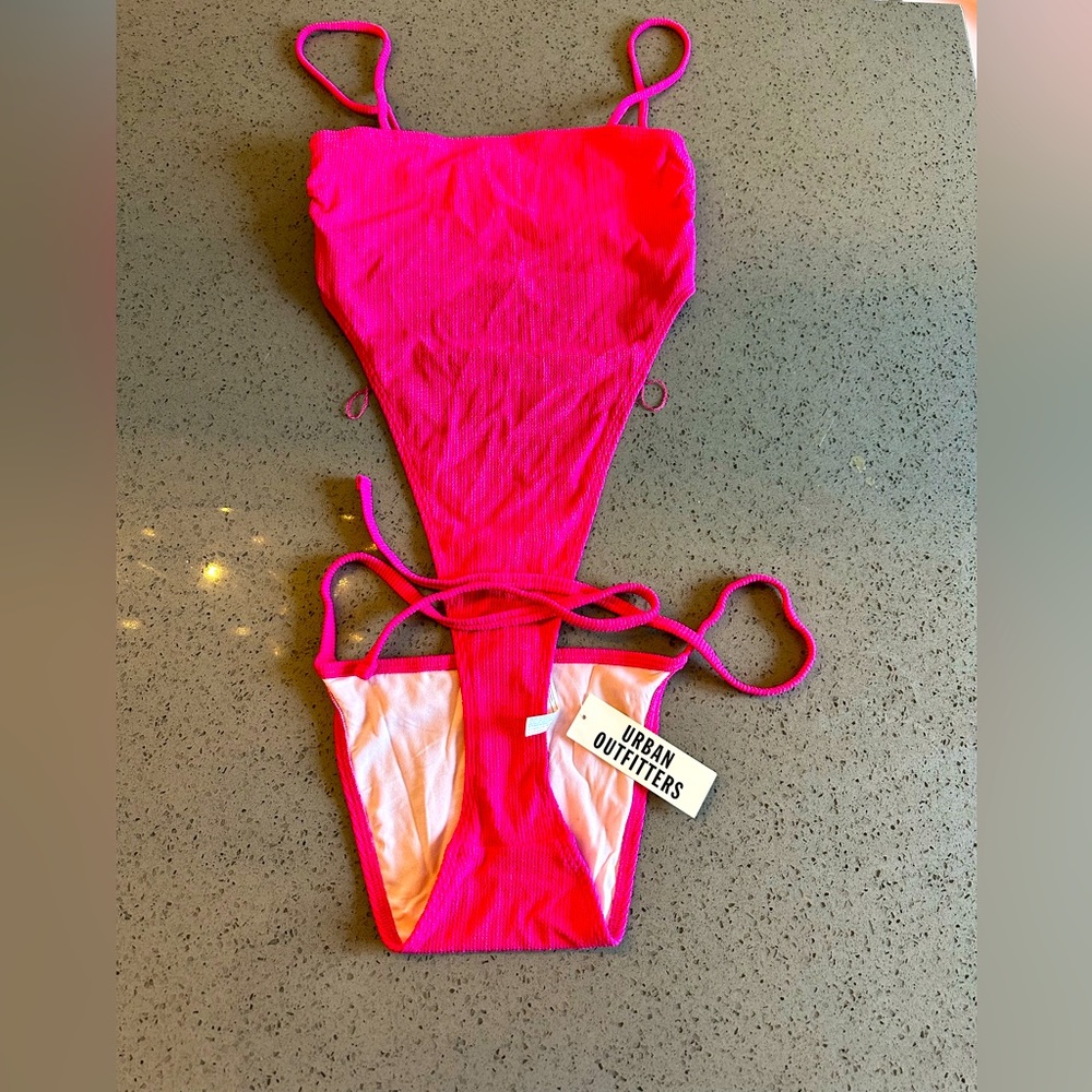 1 pc bathing suit from Urban outfitters. Tags attached, medium size, hot pink